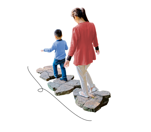 Man and son on rocks